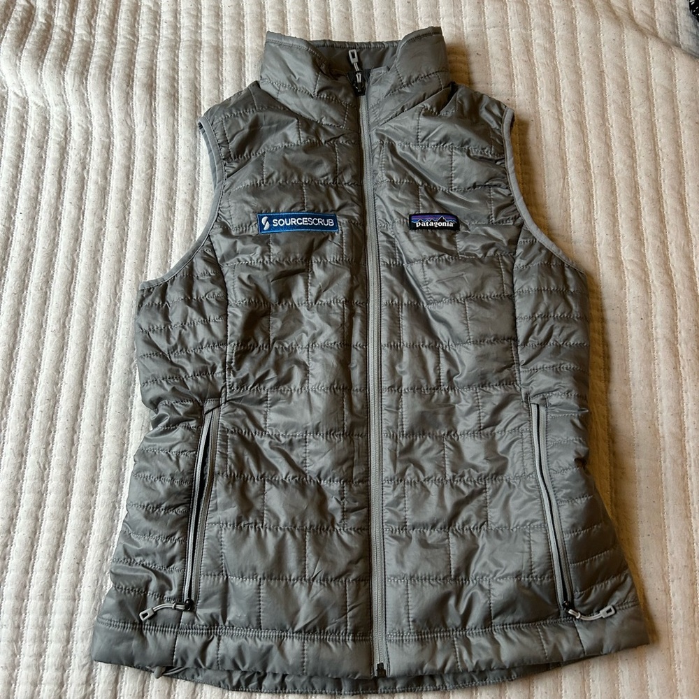 Women’s grey Patagonia vest with company logo - like new